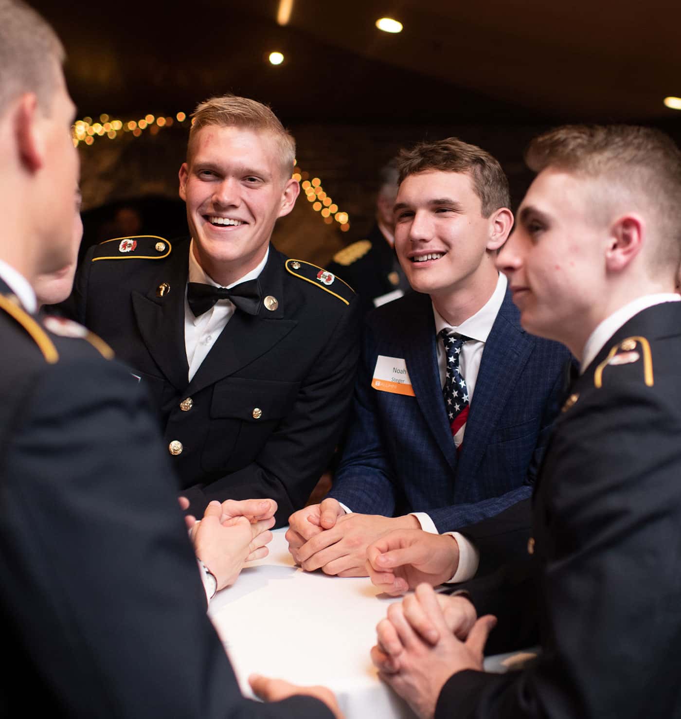 Army ROTC alumni talk during the Hall of Fame induction