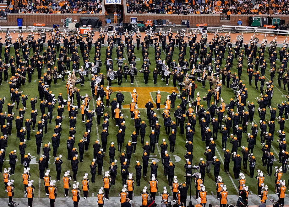 Pride of the Southland Marching Band and members of the alumni band in Neyland Stadium