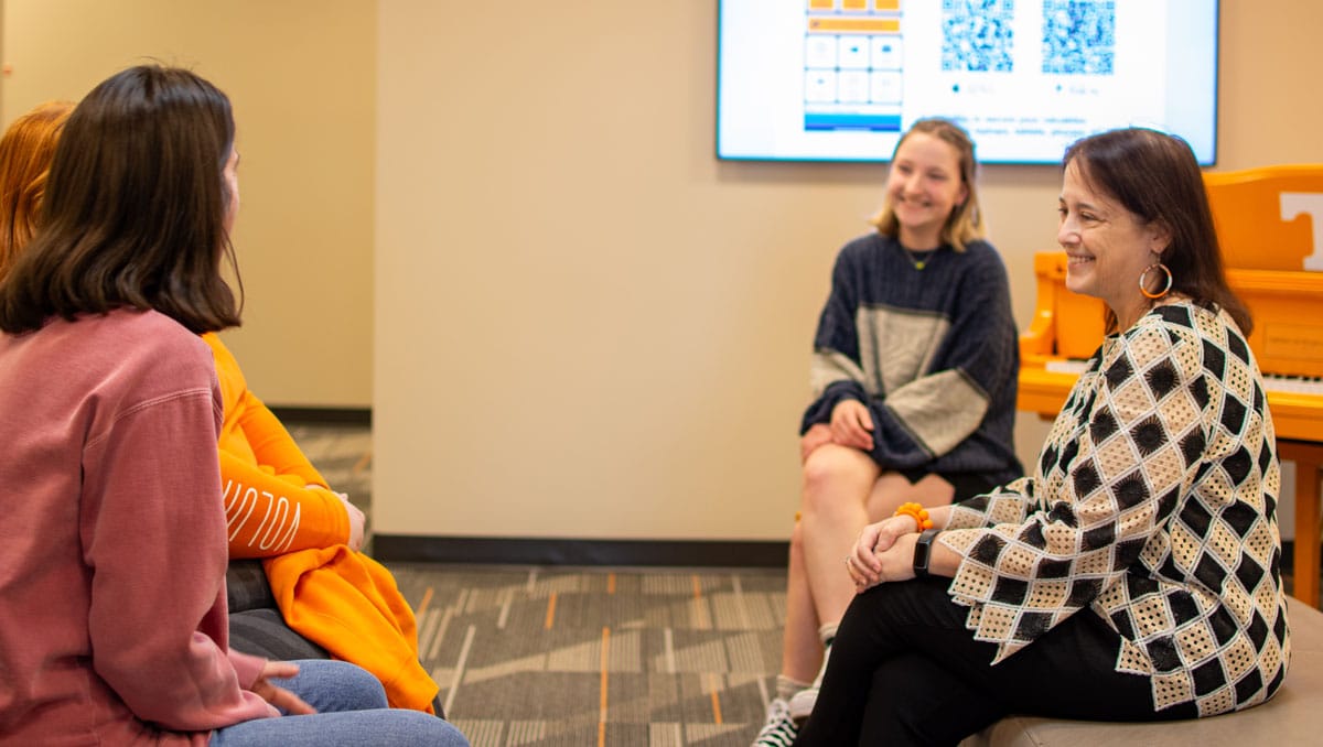 Bridget Freisthler talks with students.
