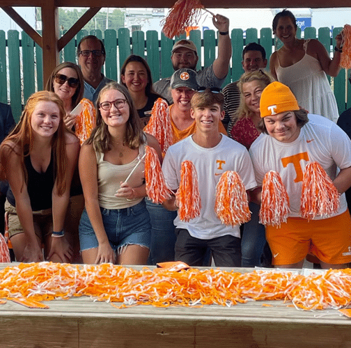 a group of incoming students pose for a photo at a Student Summer Send-Off.