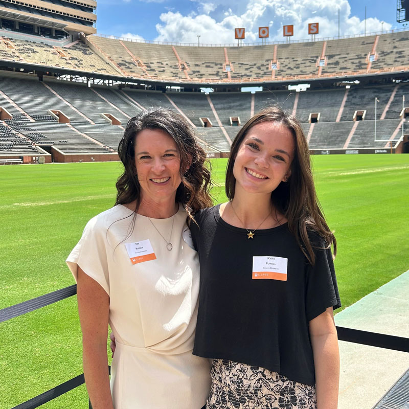 marden-kim-and-powell-kyra-in-neyland-800x800 Kim Marden and her daughter Kyra Powell post for a photo with Neyland Stadium in the background. The V-O-L-S letters can be seen behind them.