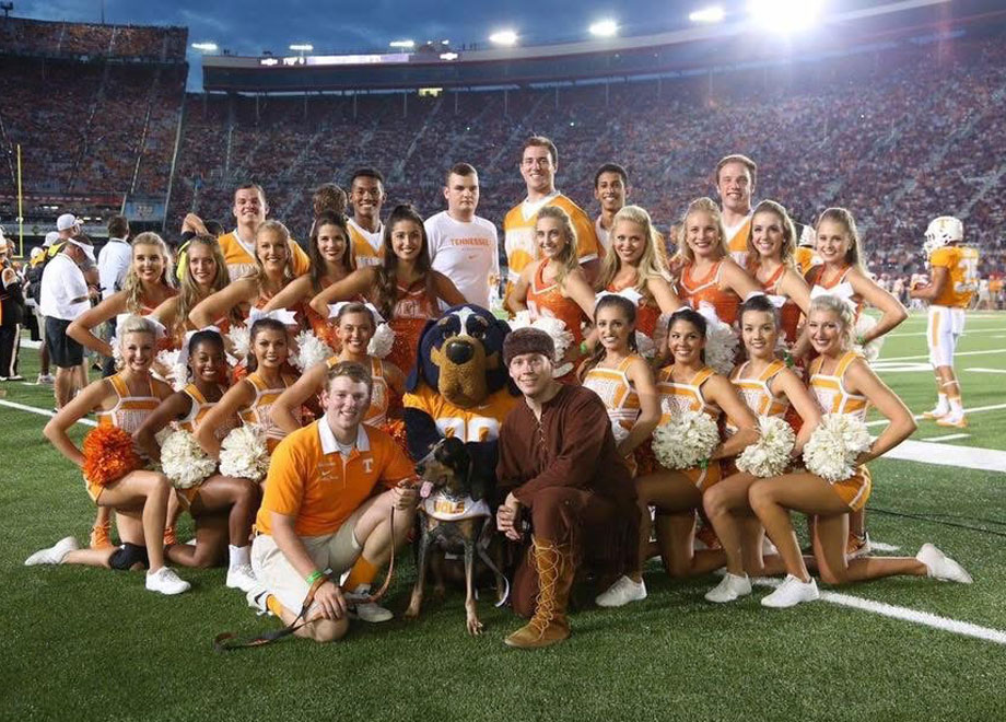 Members of the UT Spirit Program on a football field.