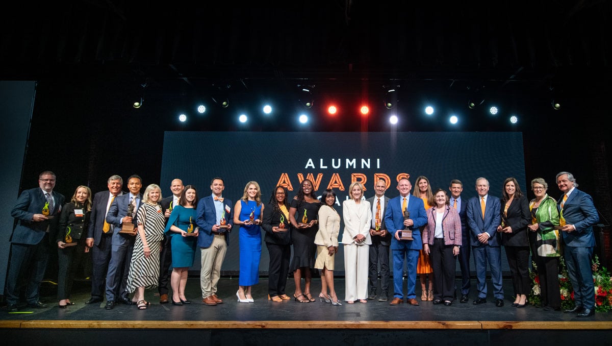 The 2025 Alumni Awards honorees on stage.