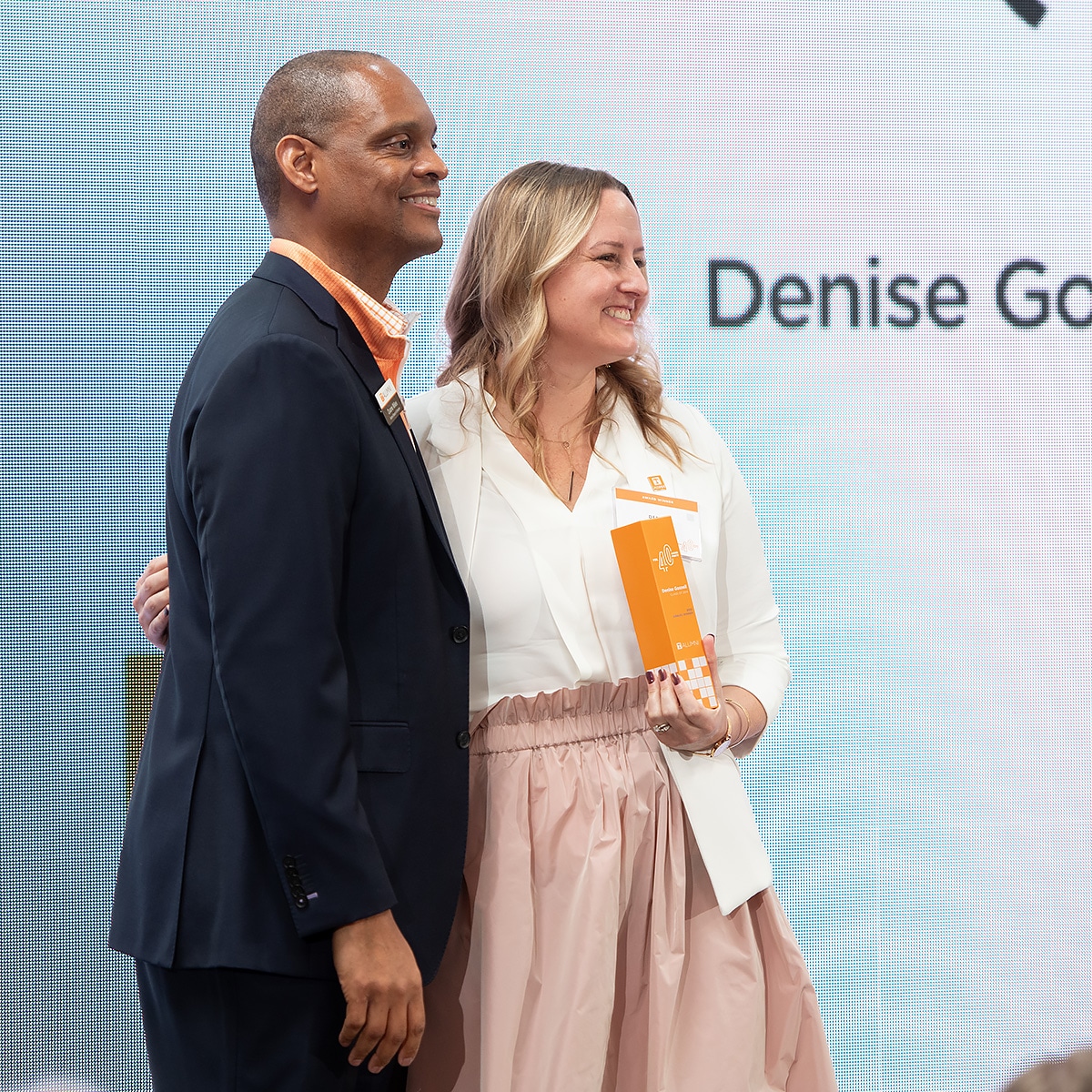 Denise Goswell and Duane Wiles posing for a photo at the 40 Under 40 event