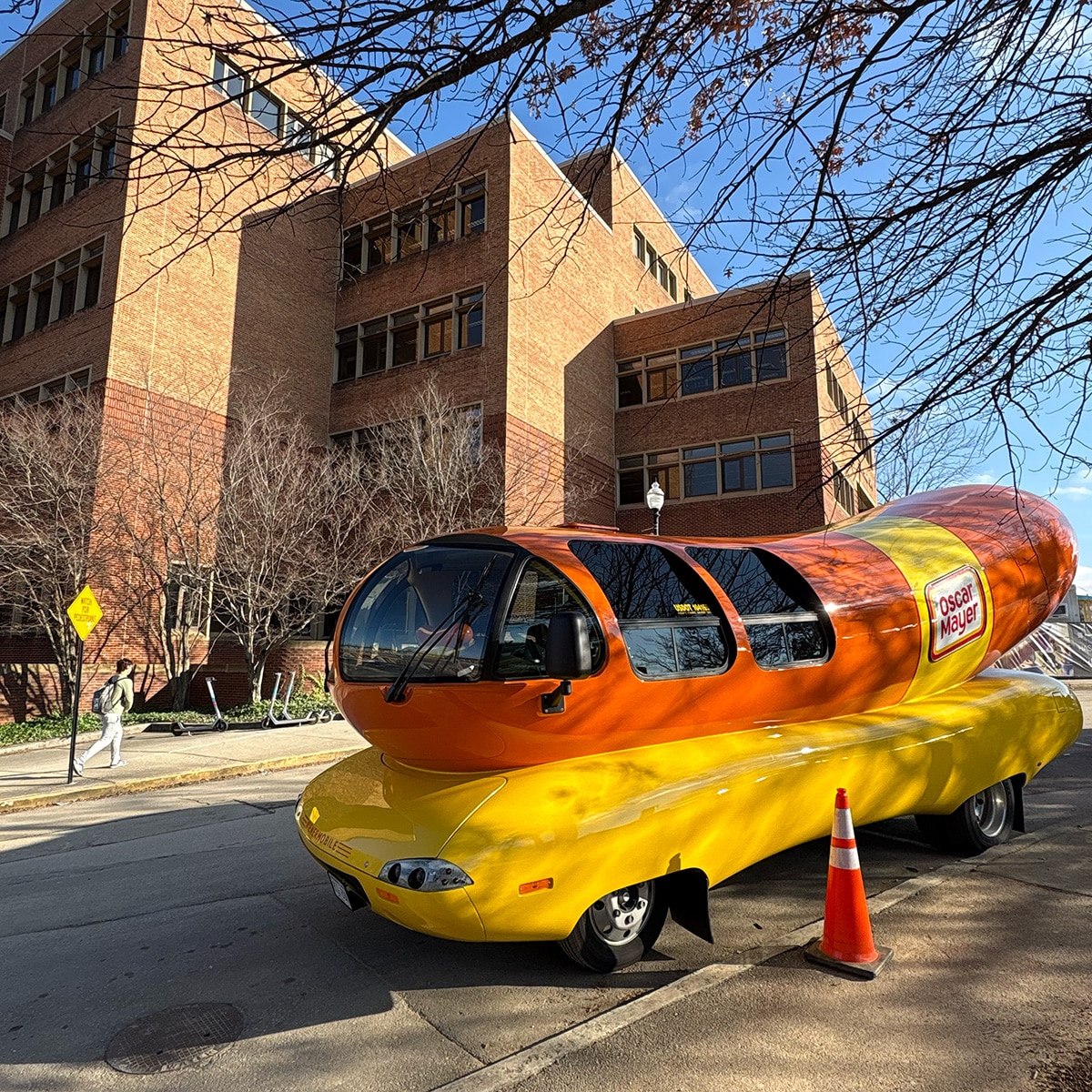 Oscar Meyer weinermobile  parked in front of the library building at the university of tennessee